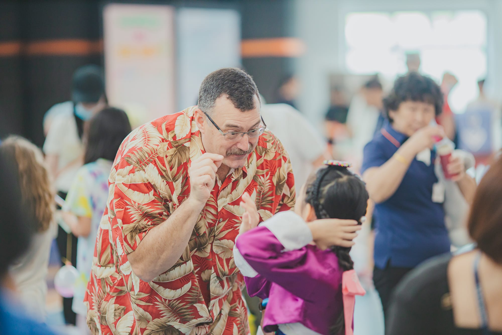 man talking to a child