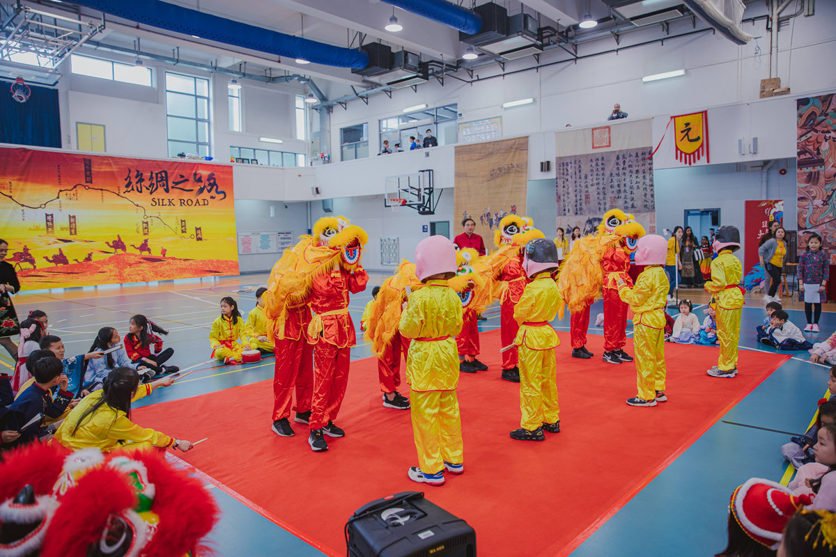 students wearing traditional costumes for the CNY culture celebration