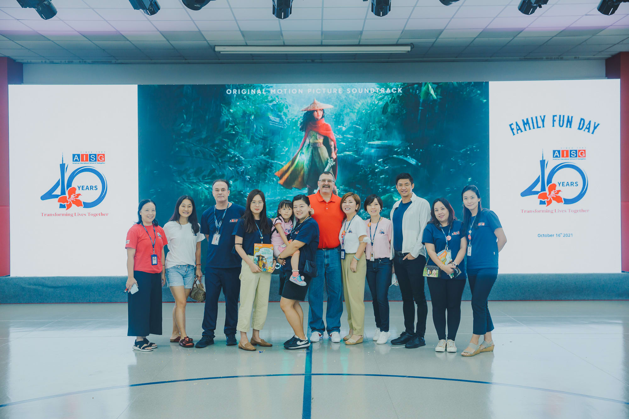 PTA group photo with director for the AISG Family Fun Day for SY2122