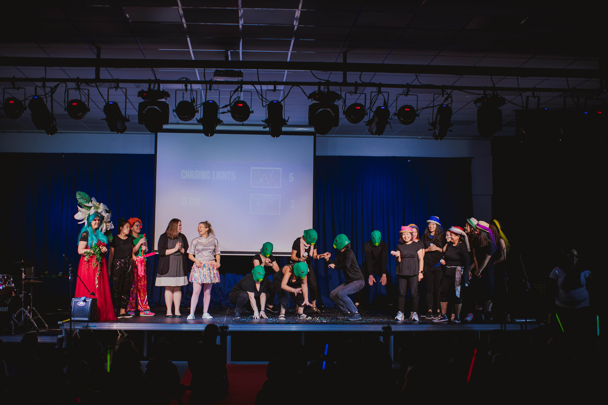 people on stage in costumes
