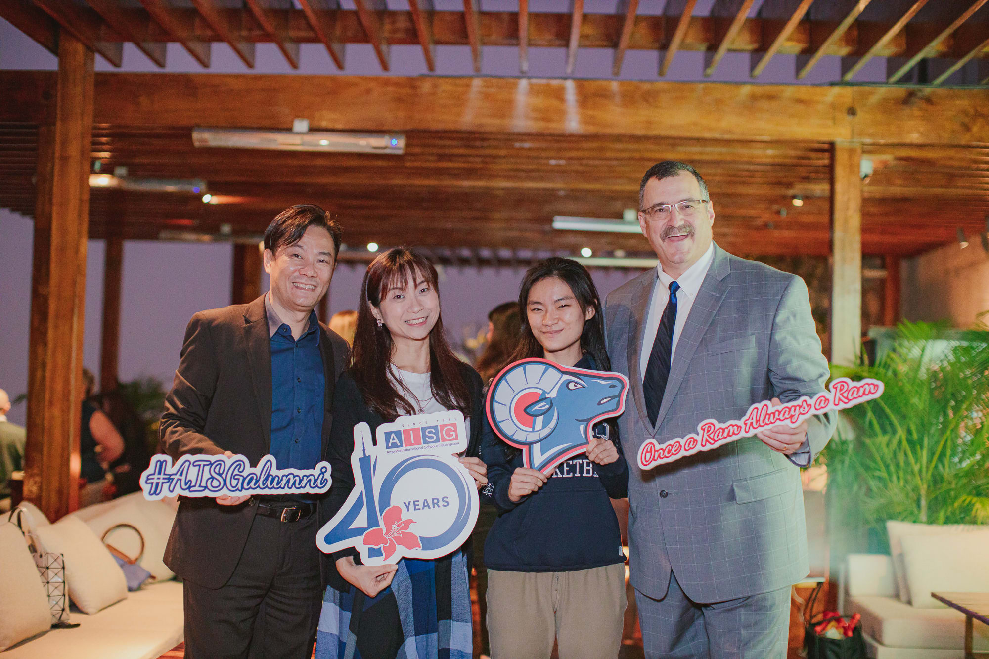 AISG alumni with current student representative and AISG director in an alumni Ram Gathering event