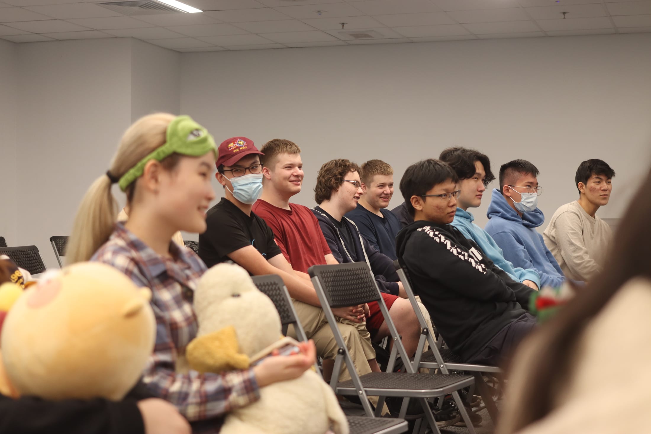 SY2122 AISG Annual Fund Speaker Series Nick Thompson speaking to crowd of Secondary School students