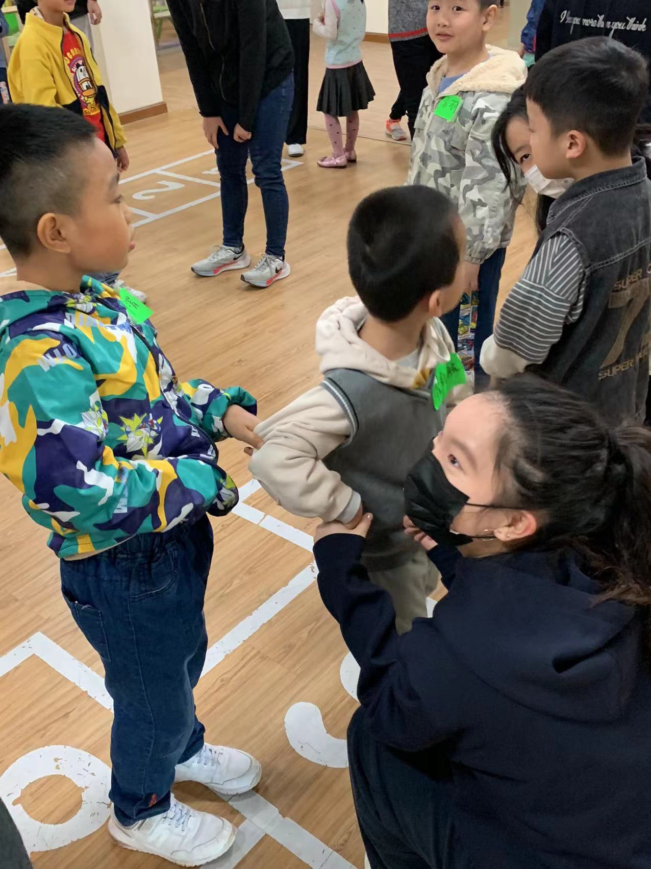 AISG Class of 2022 Senior Playing with Kids