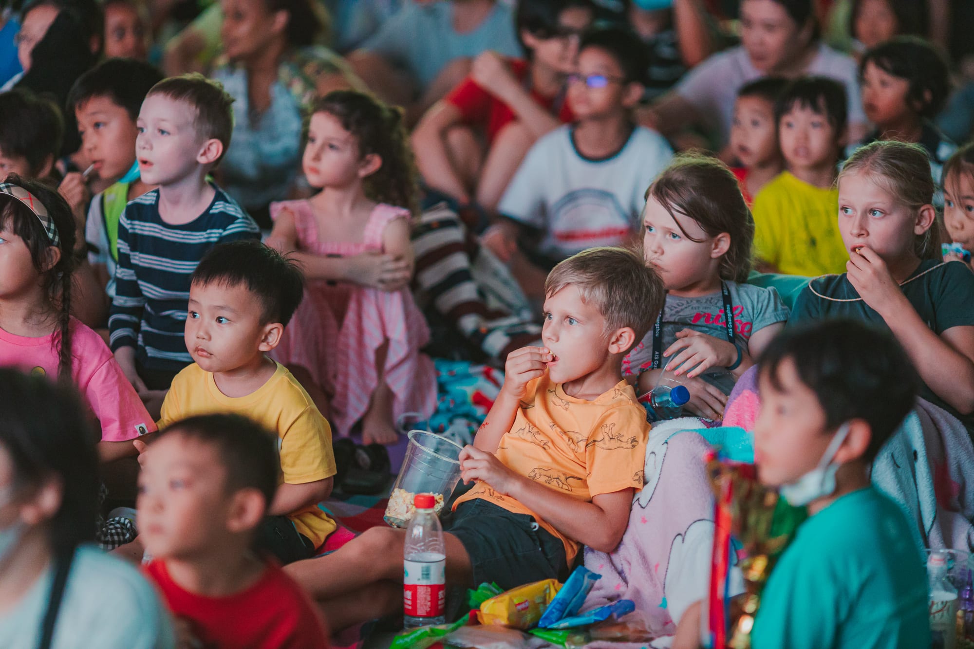 aisg family fun day movie picnic crowd