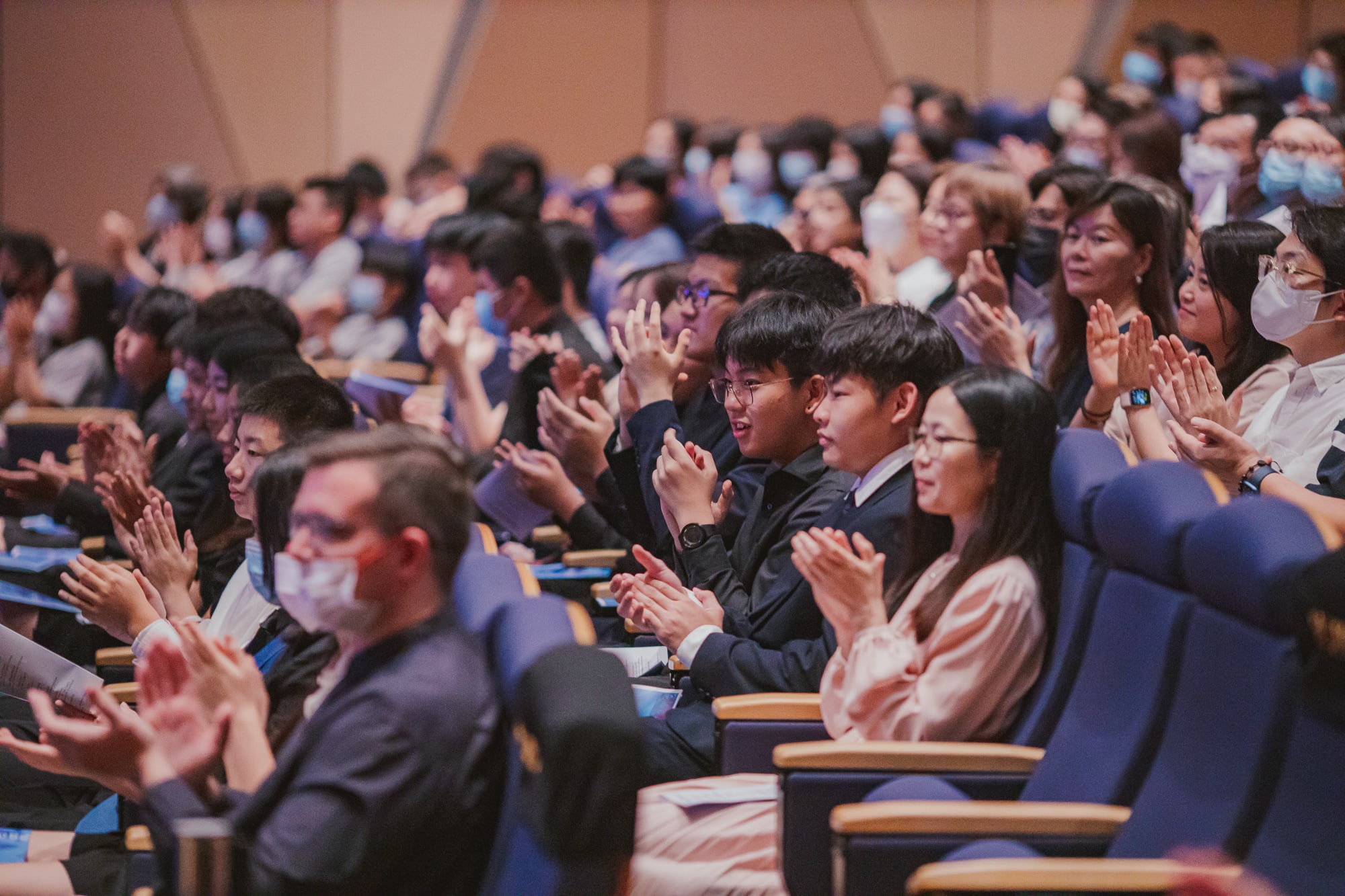 AISG Grade 8 Promotion audience clapping