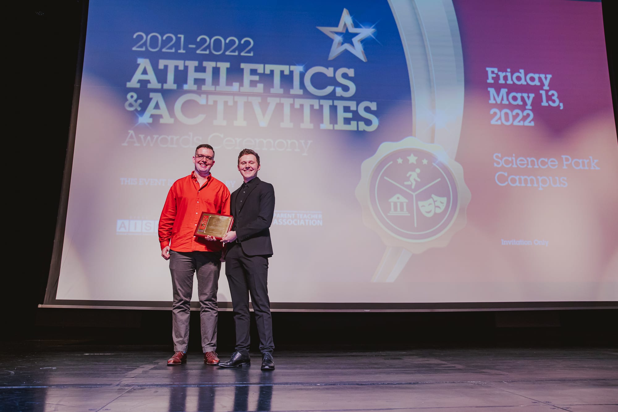 AISG Athletics & Activities Awards Ceremony presenting male performer of the year award