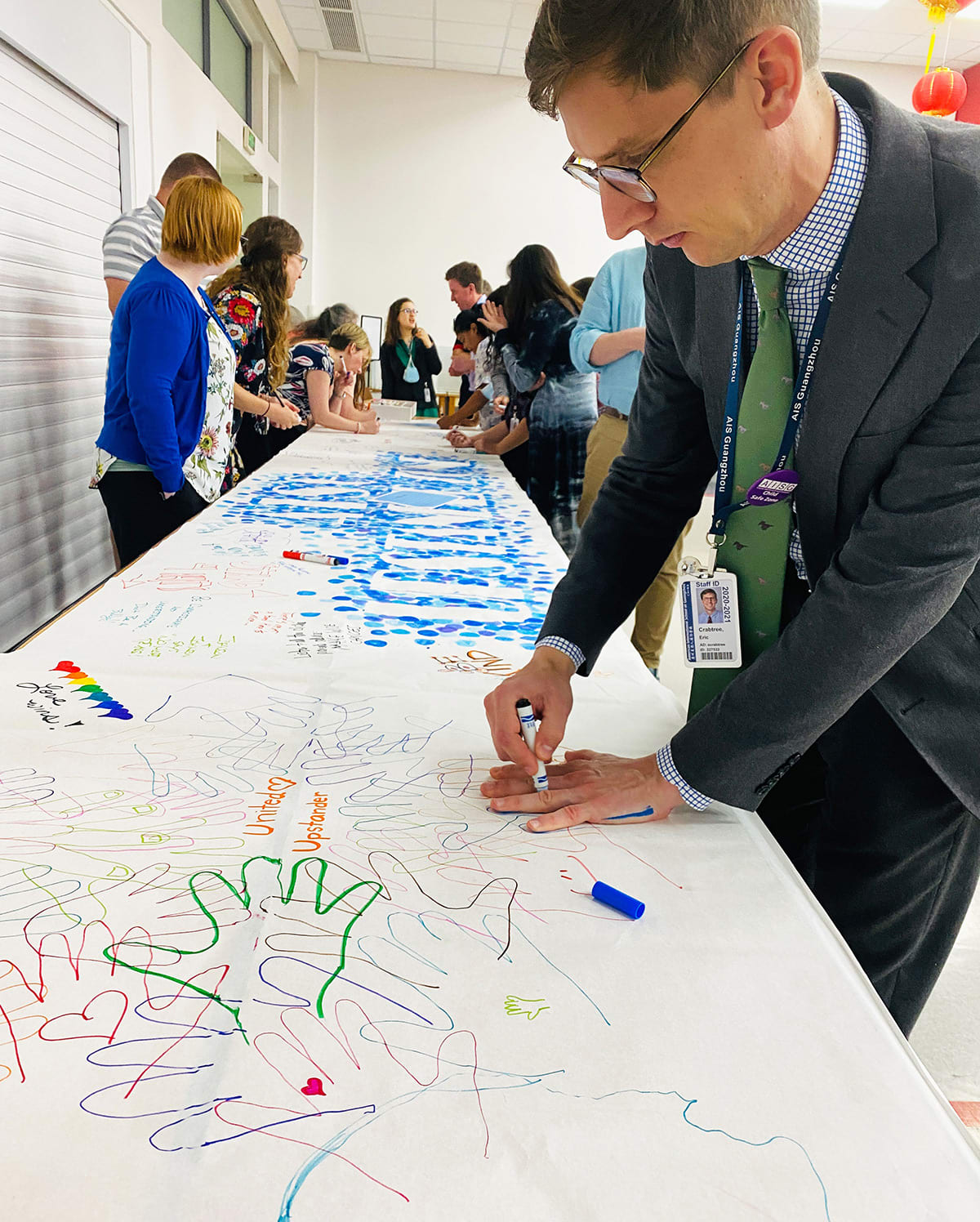 Primary school Assistant Principle and other teacher are drawing