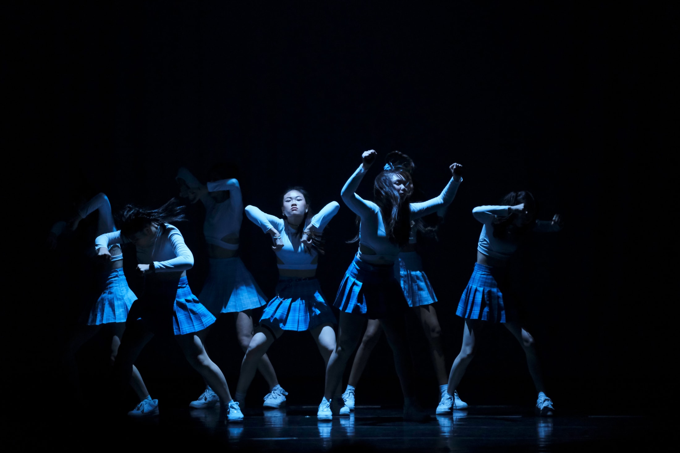 AISG at APAC in Shanghai with dancers in blue light