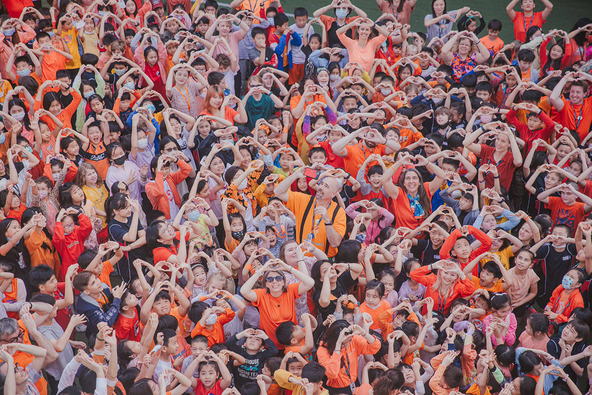 Taking picture of students and teachers from drone