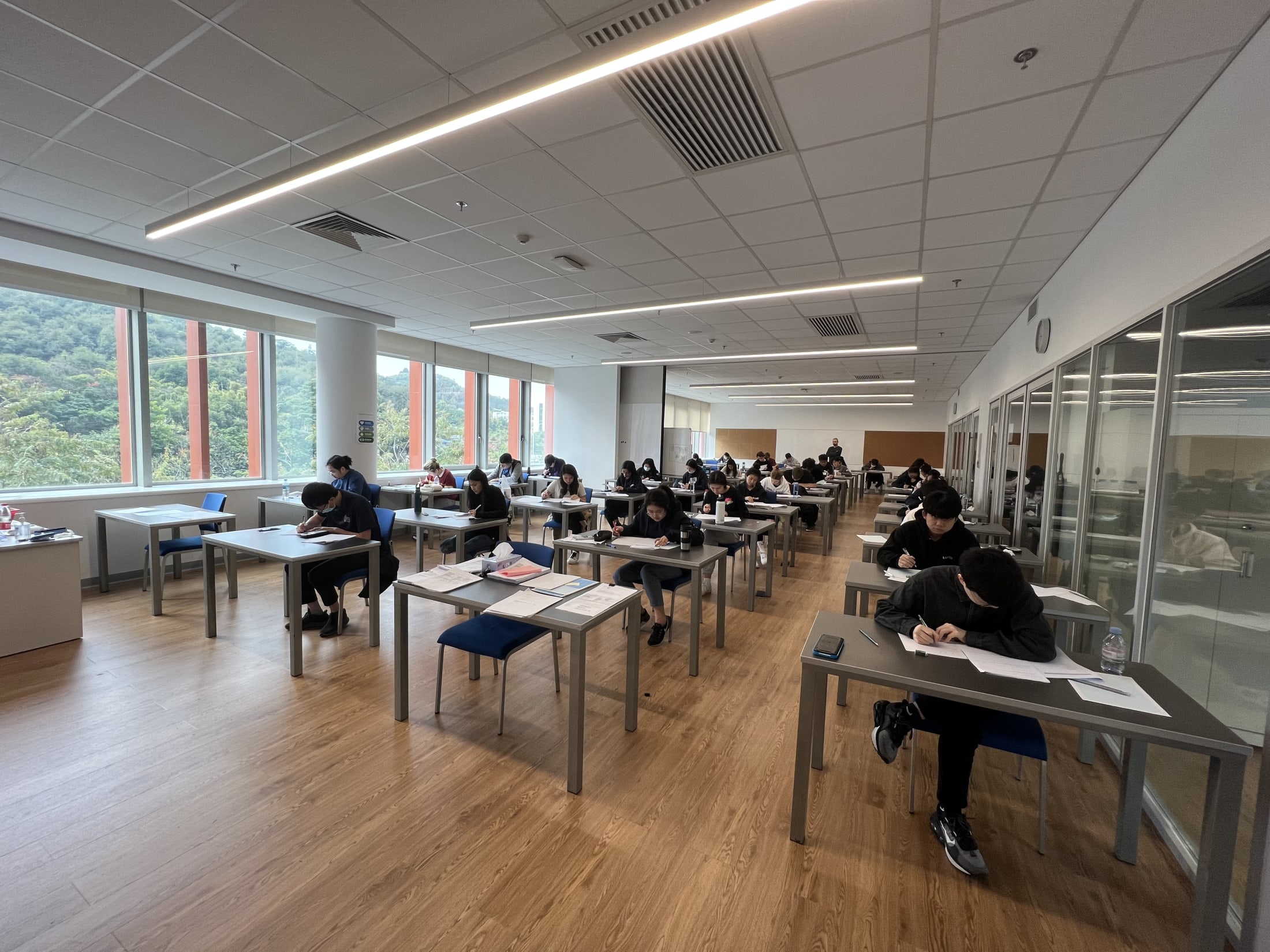 AISG students taking a mock IB exam in AISG classroom (front view)