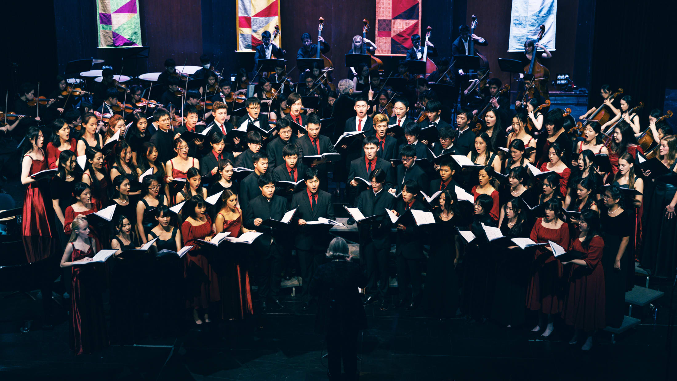 AISG at APAC in Shanghai with orchestra and choir performing together