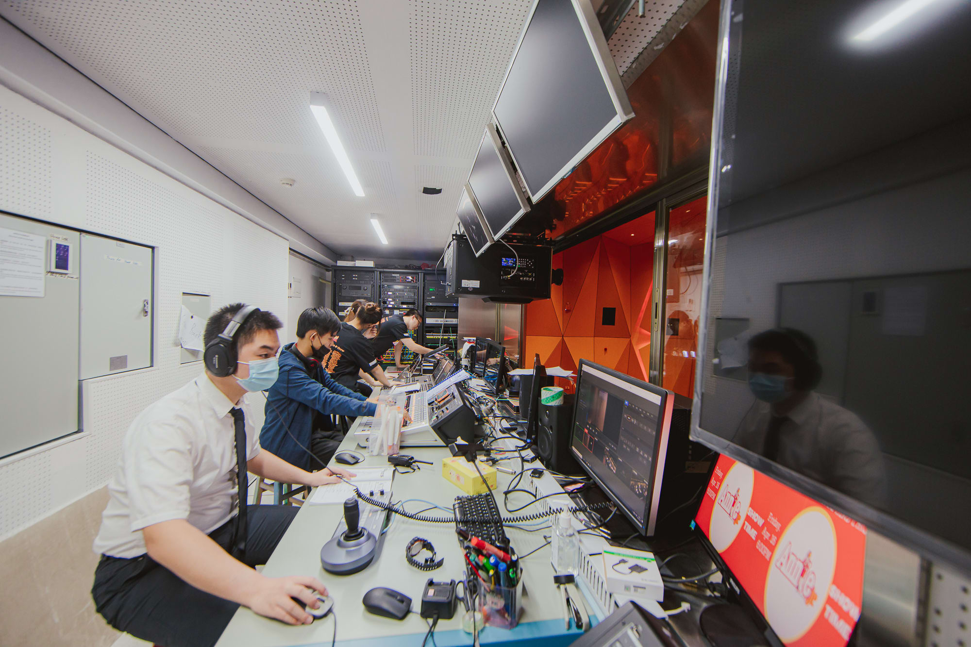 students in the theater's technical booth