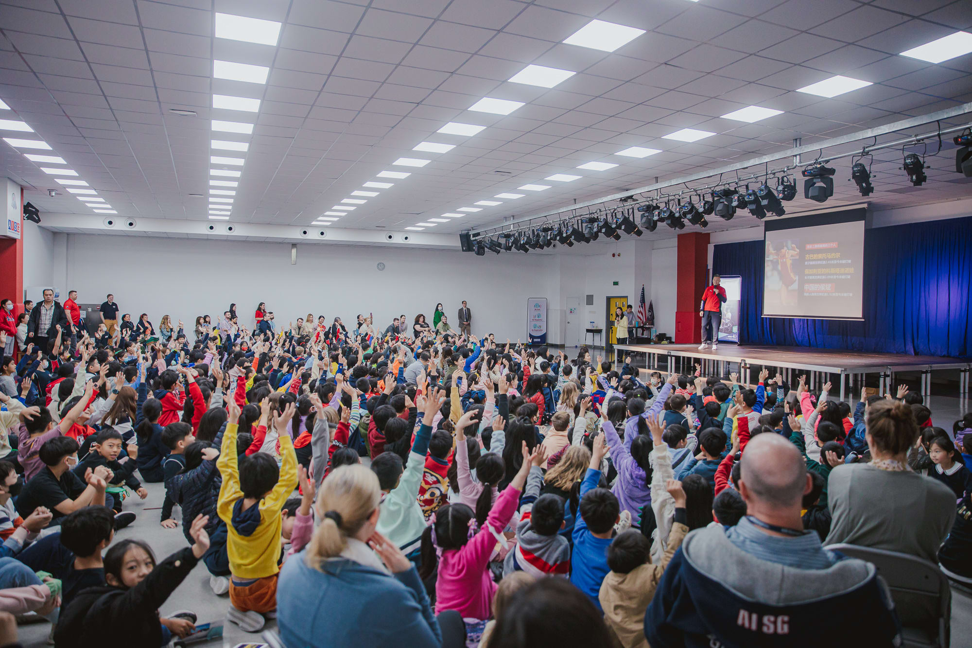 AISG Speaker Series with Hou Bin picking volunteers from students