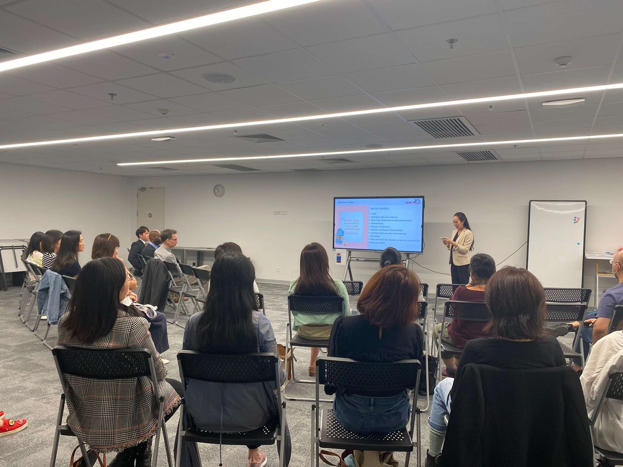 AISG school counselor talk to parents for AISG Child Protection Awareness Month