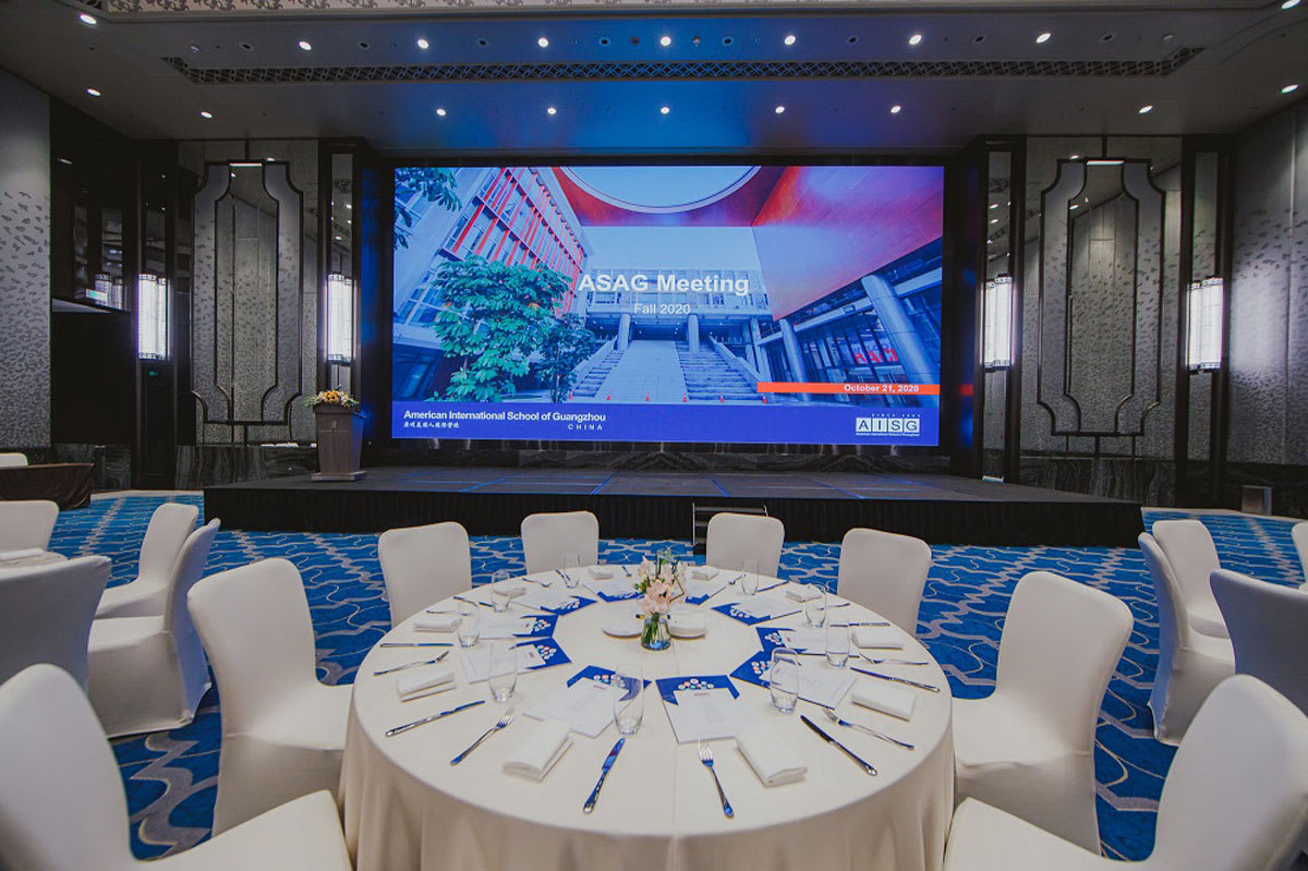 table and presentation screen at the asag meeting