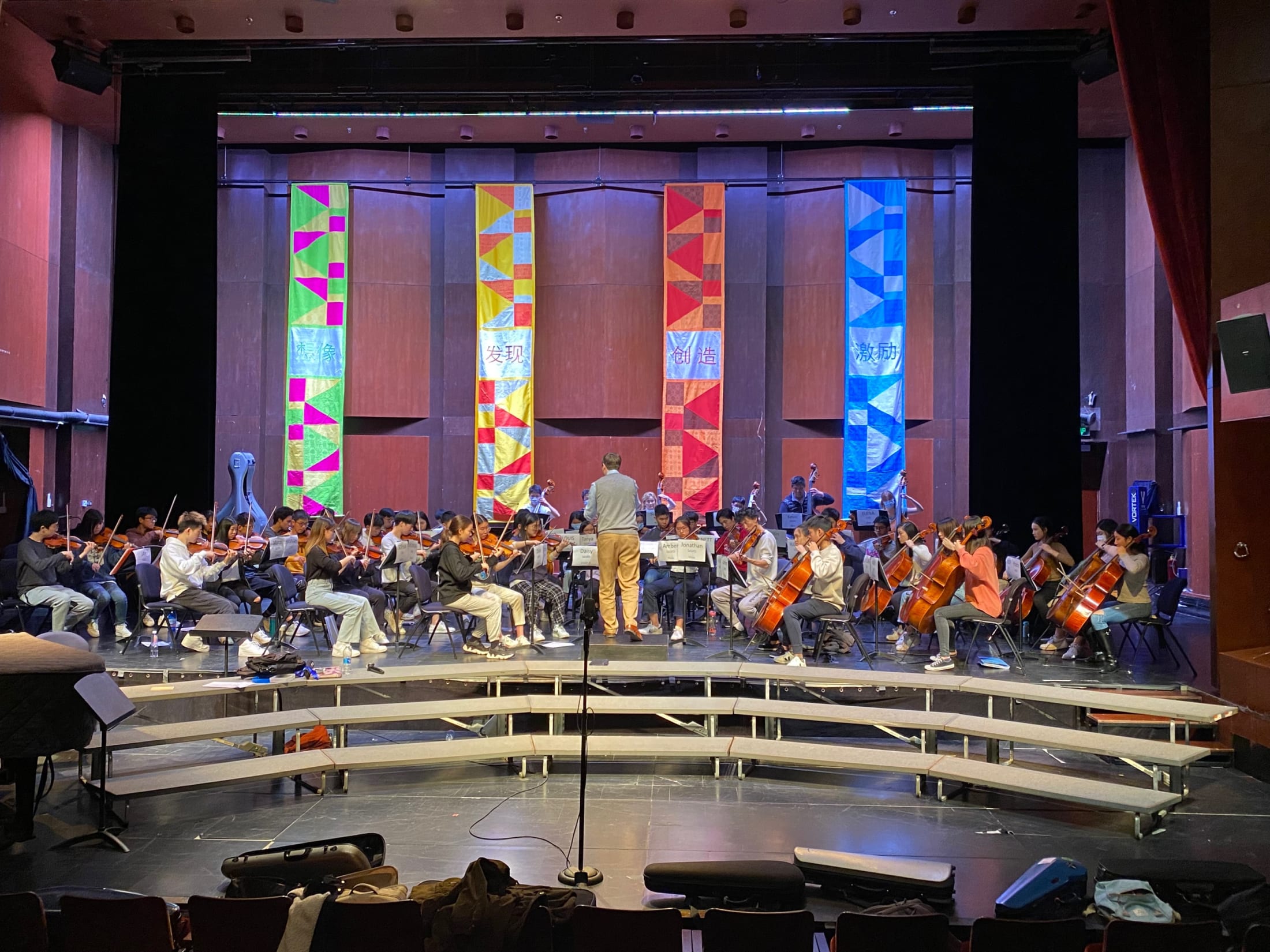AISG at APAC in Shanghai with wide-shot of orchestra students