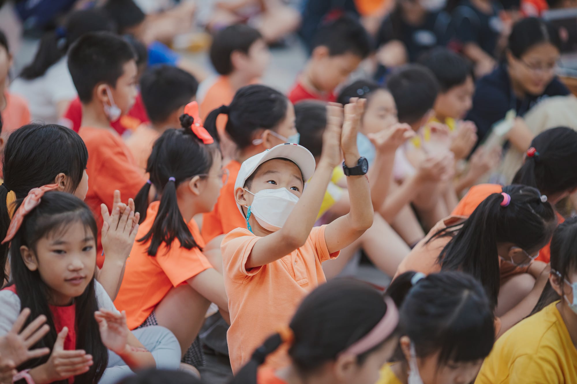 AISG Elementary School students clapping at Upstander assembly