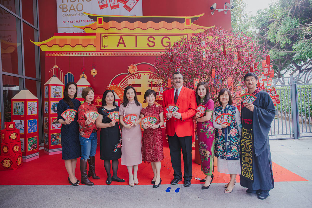 members of the aisg community showing the beauty of gifts with envelopes