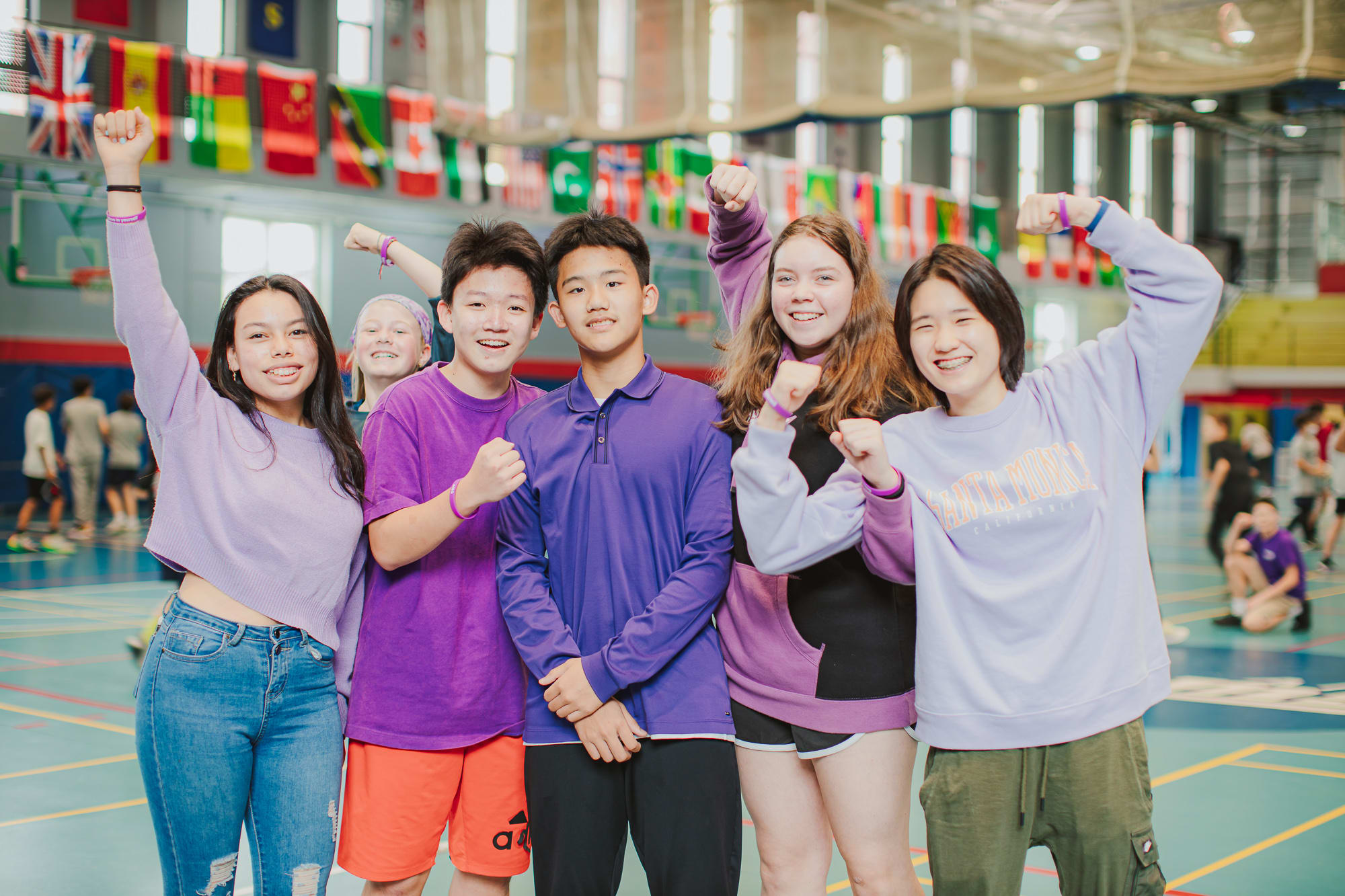 Secondary students wearing purple for AISG Child Protection Awareness Month