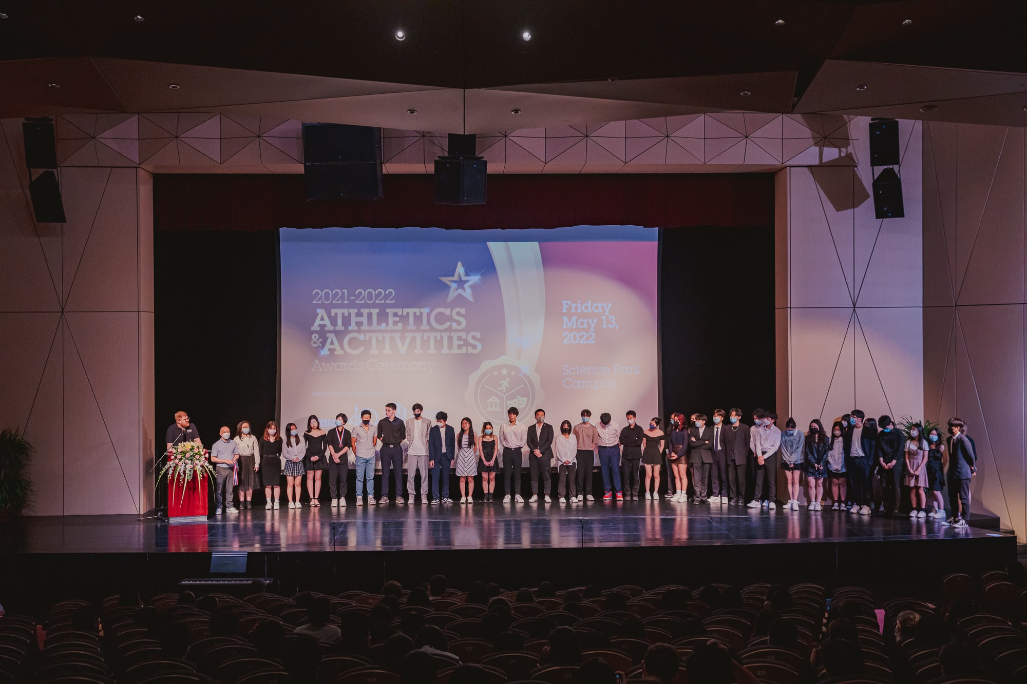 AISG Athletics & Activities Awards Ceremony group photo of students
