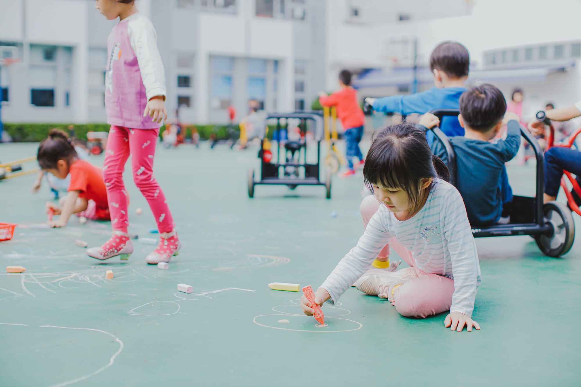 AISG elementary school students playing and learning