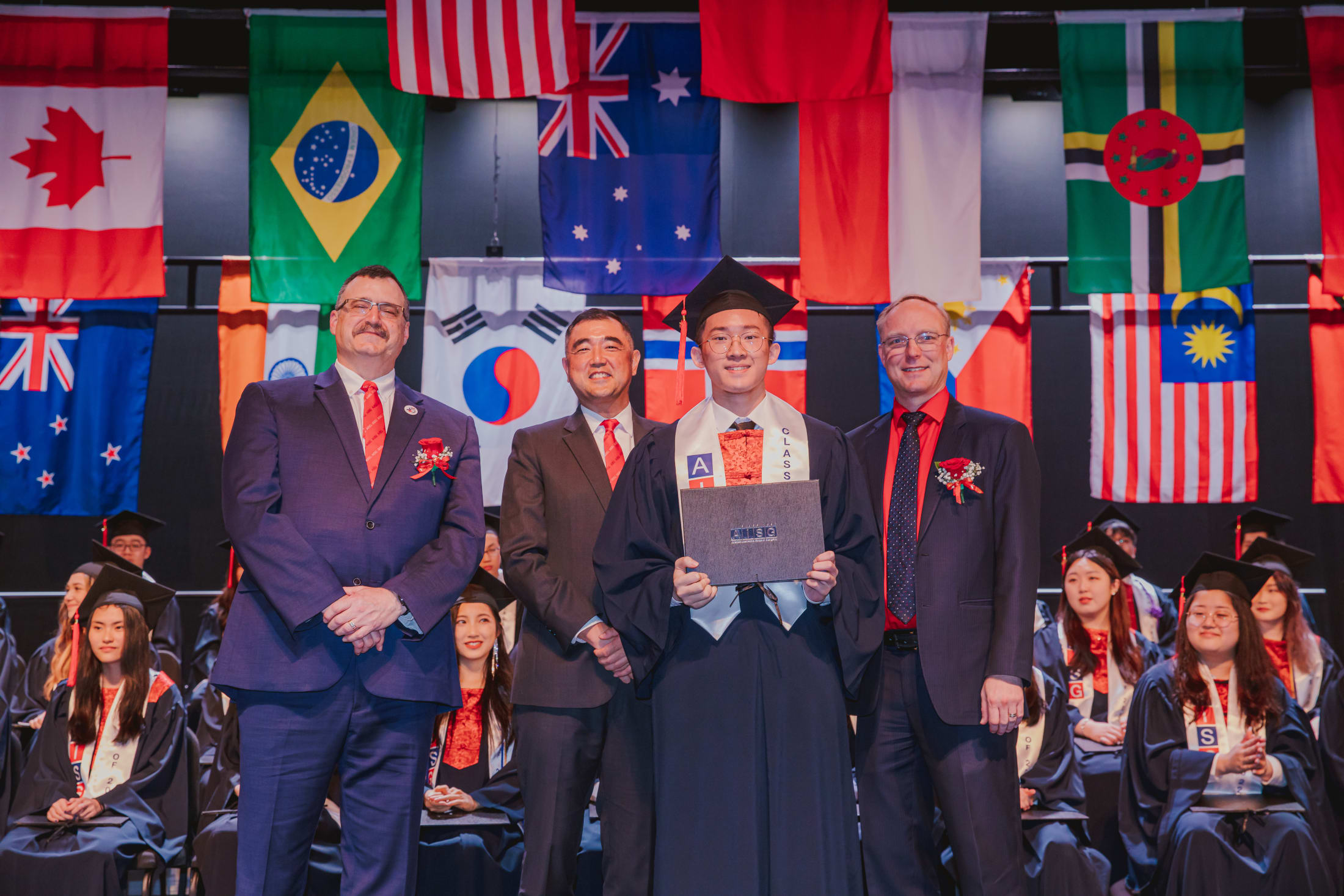 AISG senior getting his diploma
