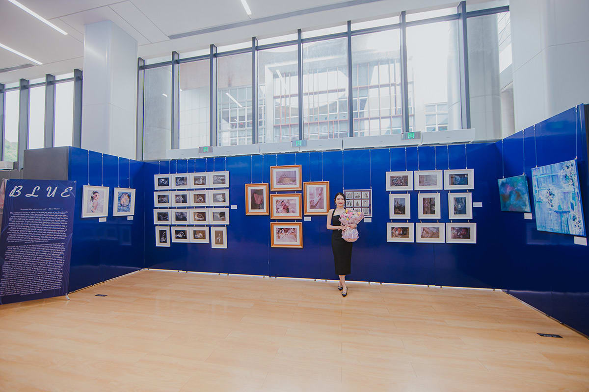 Student and her booth