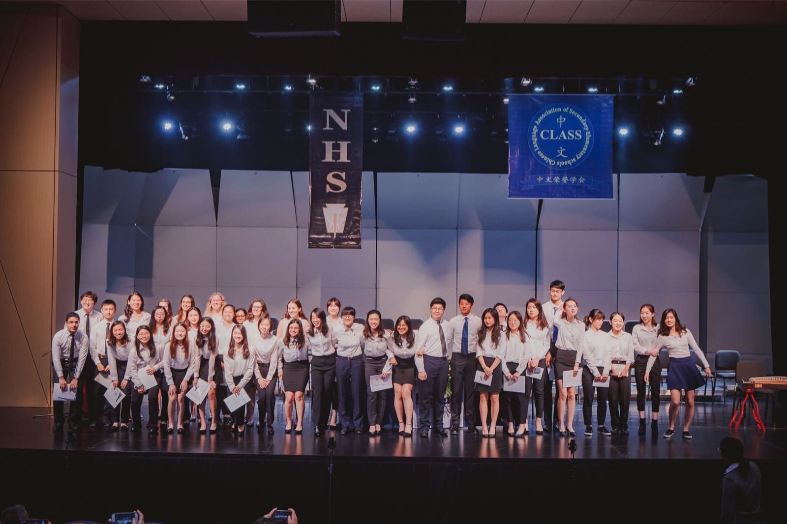 NHS and NCHS National Honor Society and National Chinese Honor Society students at the American International School of Guang