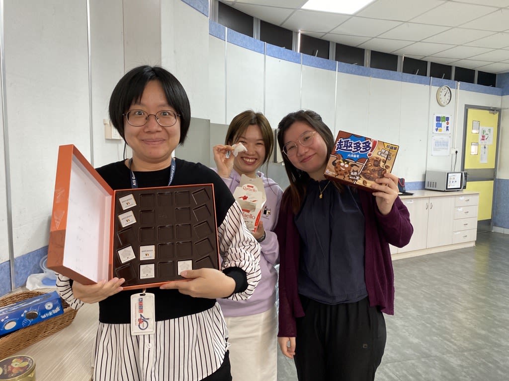 AISG celebrates Teacher Appreciation Week with teachers showing the sweets in the boxes