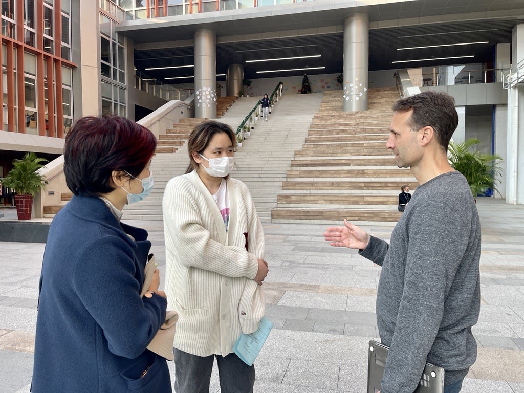 AISG College Counselor talks with parent and student