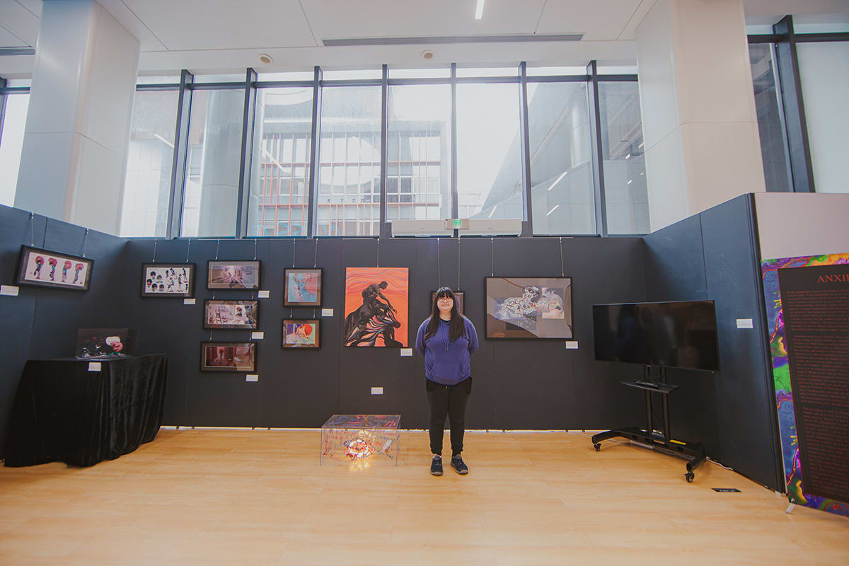 Student and her booth