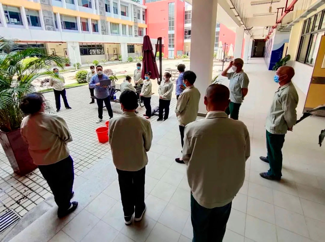 picture of staff getting trained on keeping school clean