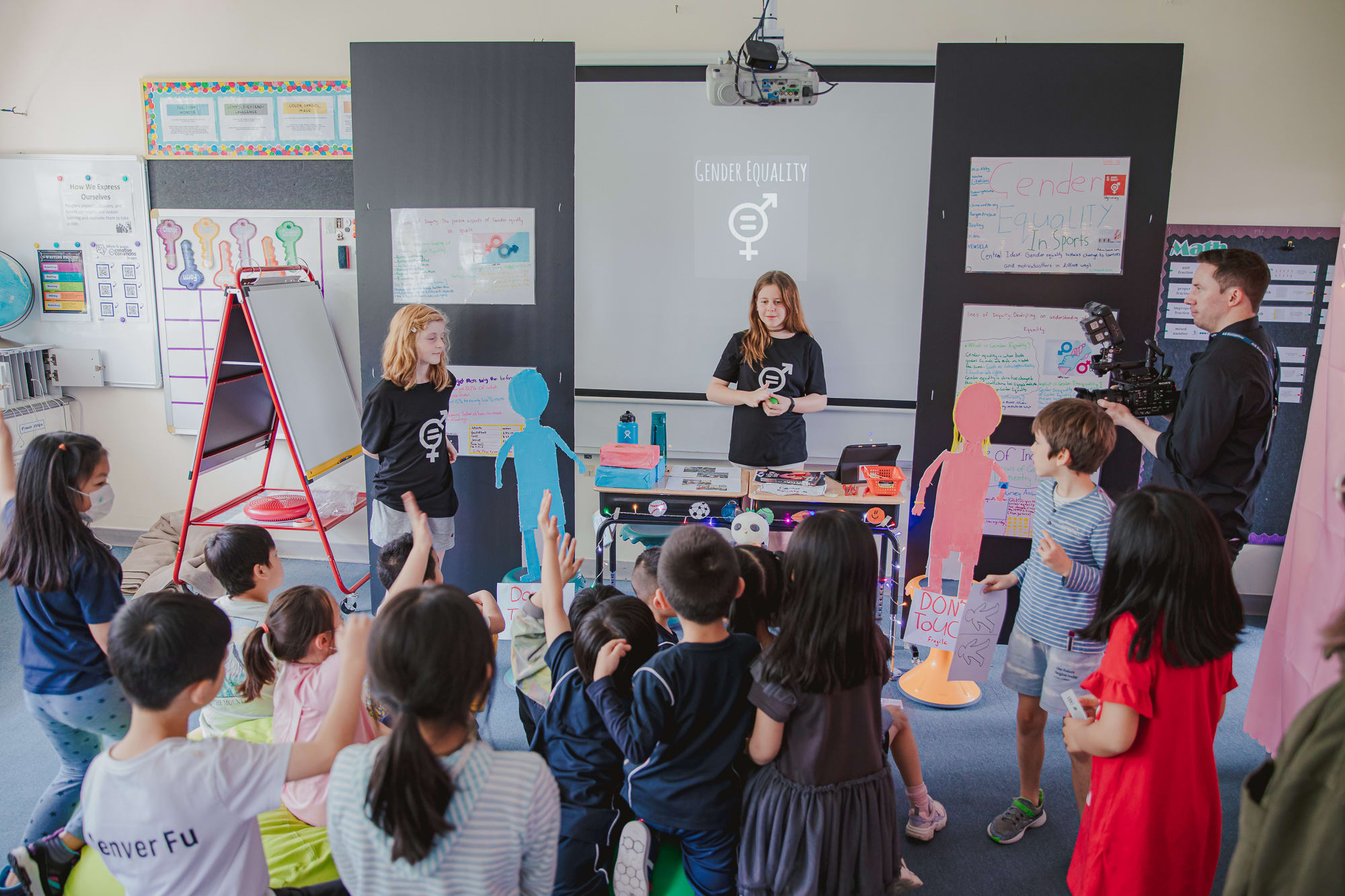 AISG PYP Exhibition with students presenting on Gender Equality to the audience