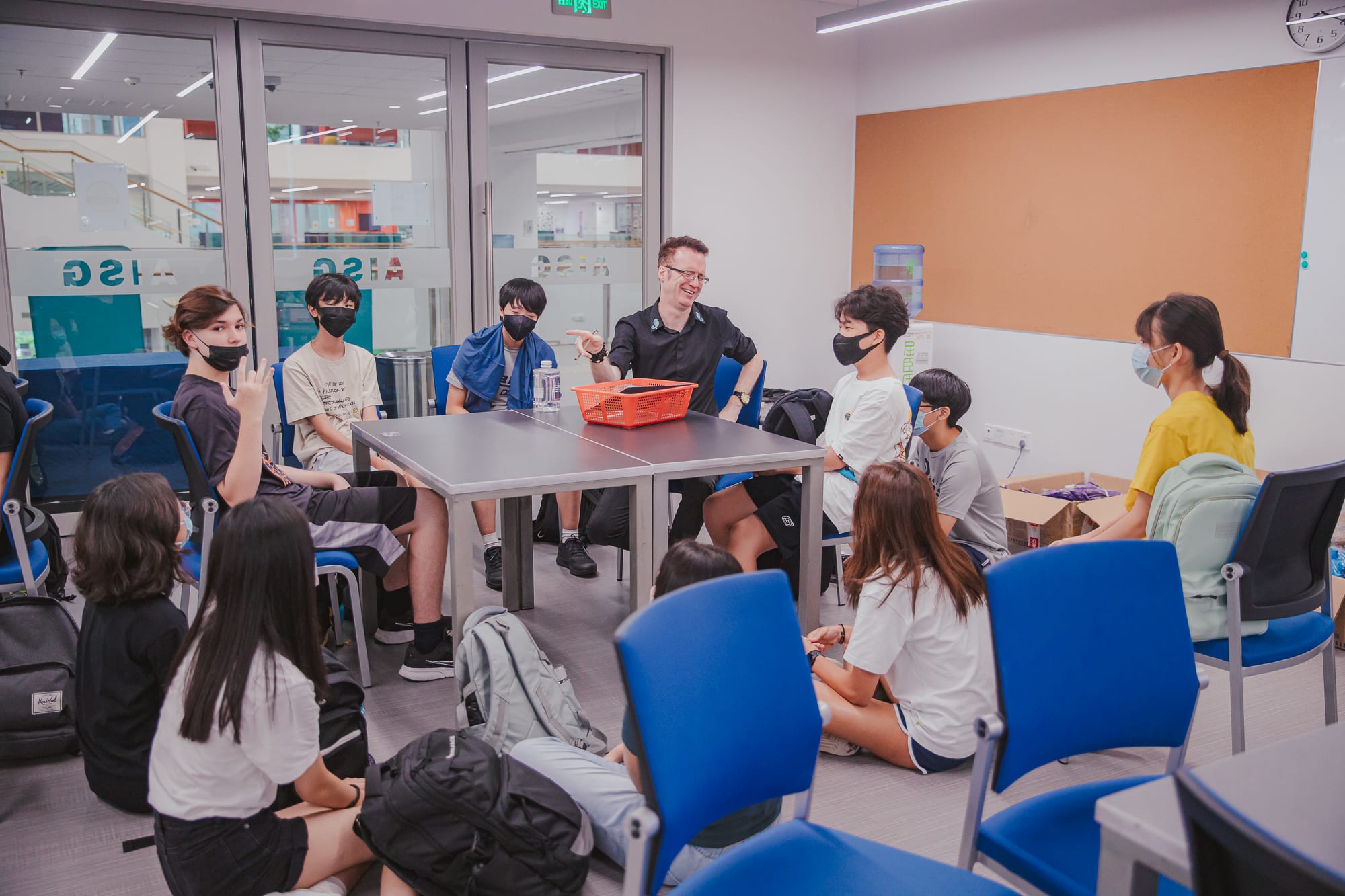 AISG students classroom laughing back to school