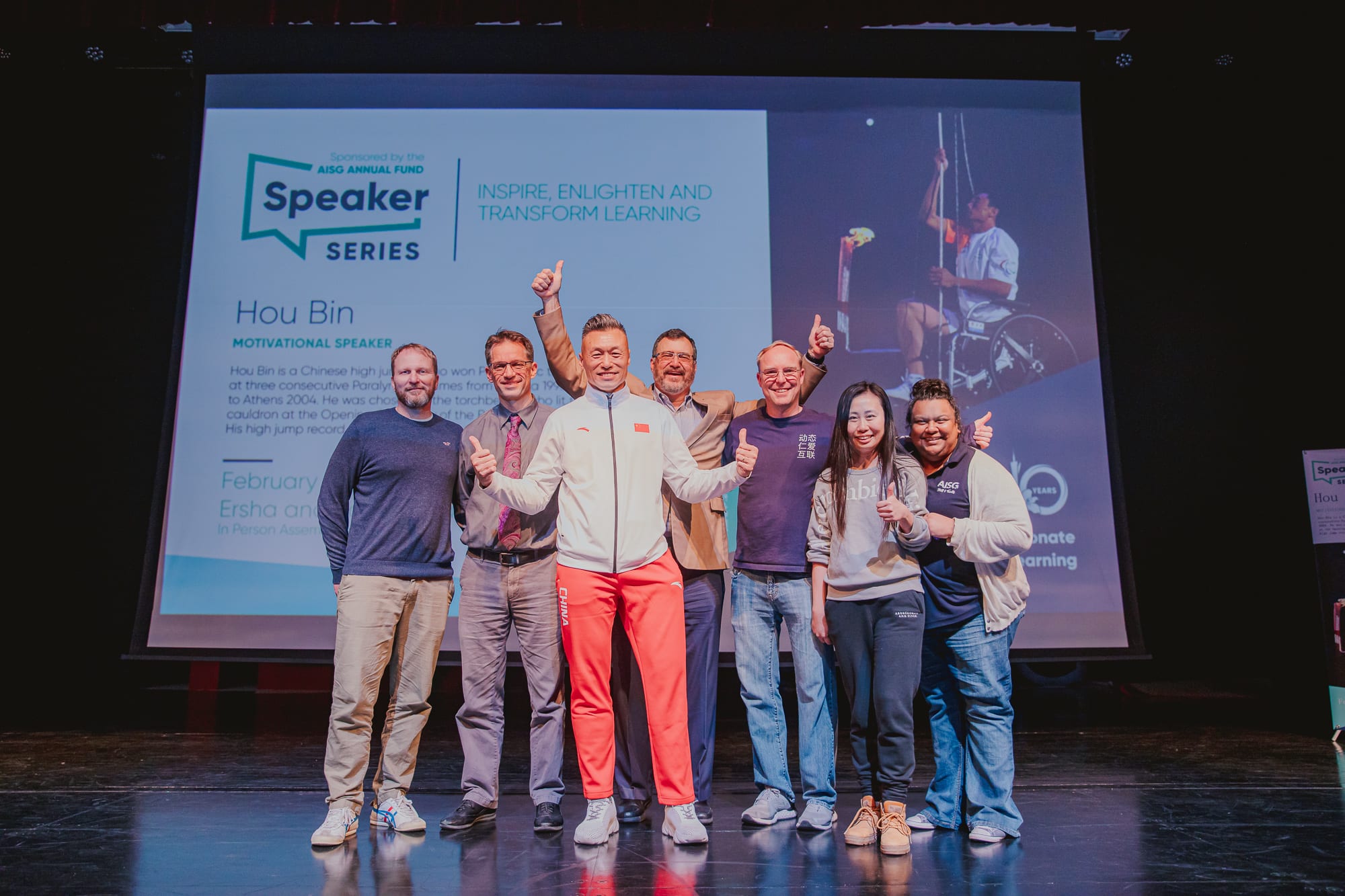 AISG Speaker Series with Hou Bin with staff and administration on stage