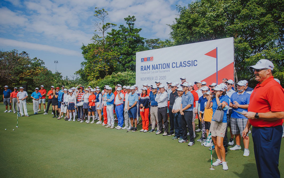 many people awaiting the start of the golf classic