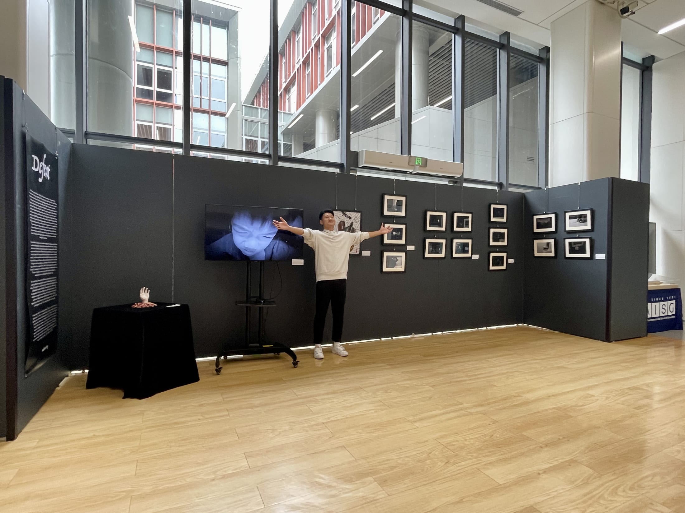 AISG 2022 Art Exhibition Individual in front of his works