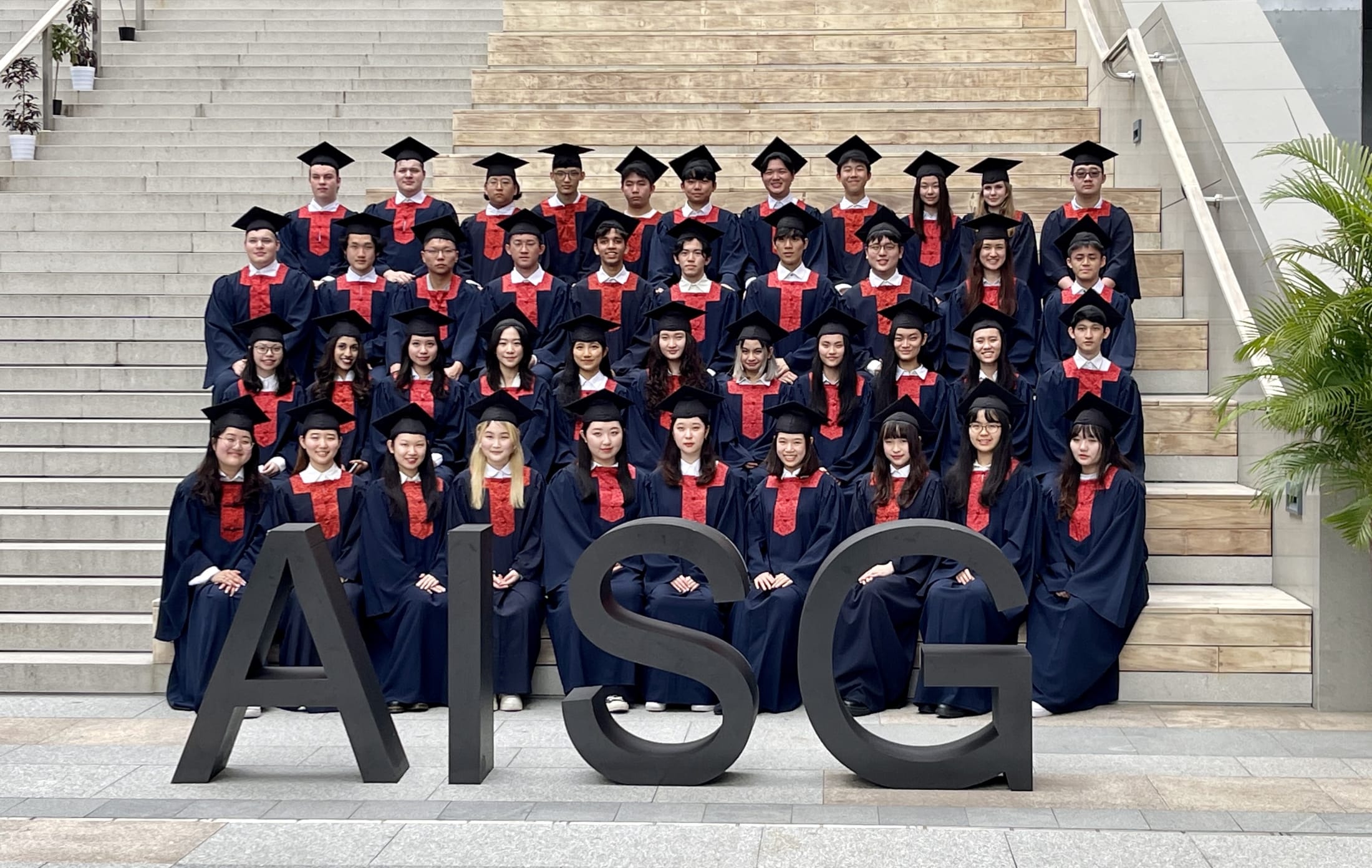 AISG Seniors with their cap and gown